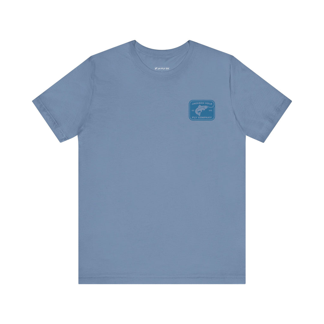 JHFLYCO Teton Brown Trout Badge Tee - Hackle Blue Logo